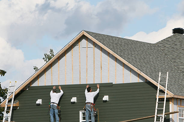 Professional Siding Contractor technician working in Manakin Sabot, VA